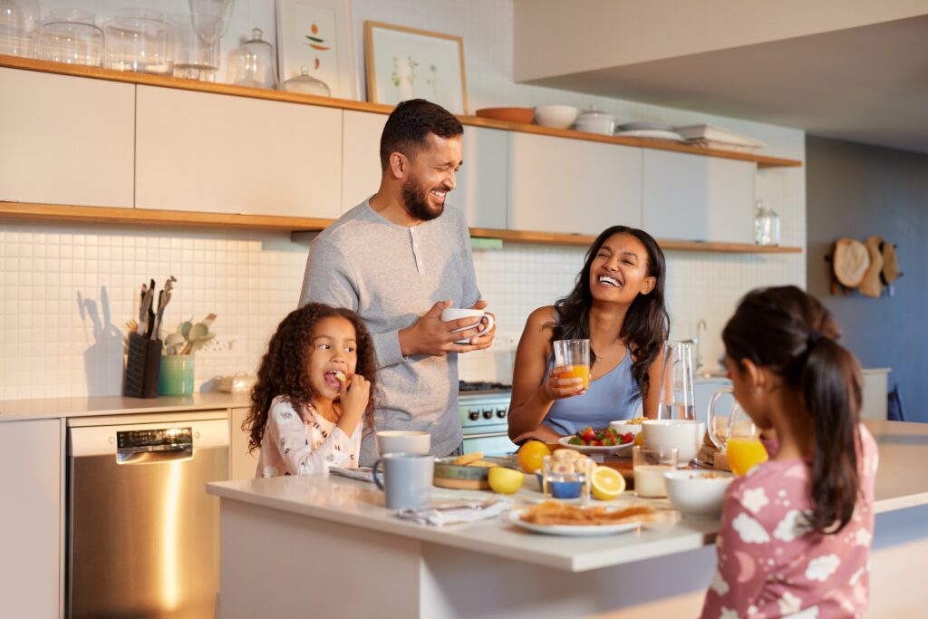 a hispanic Colorado Family happy in the kitchen